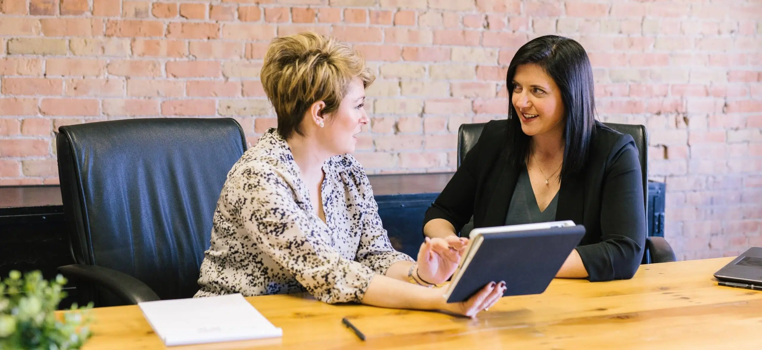 A manager leading an employee coaching conversation